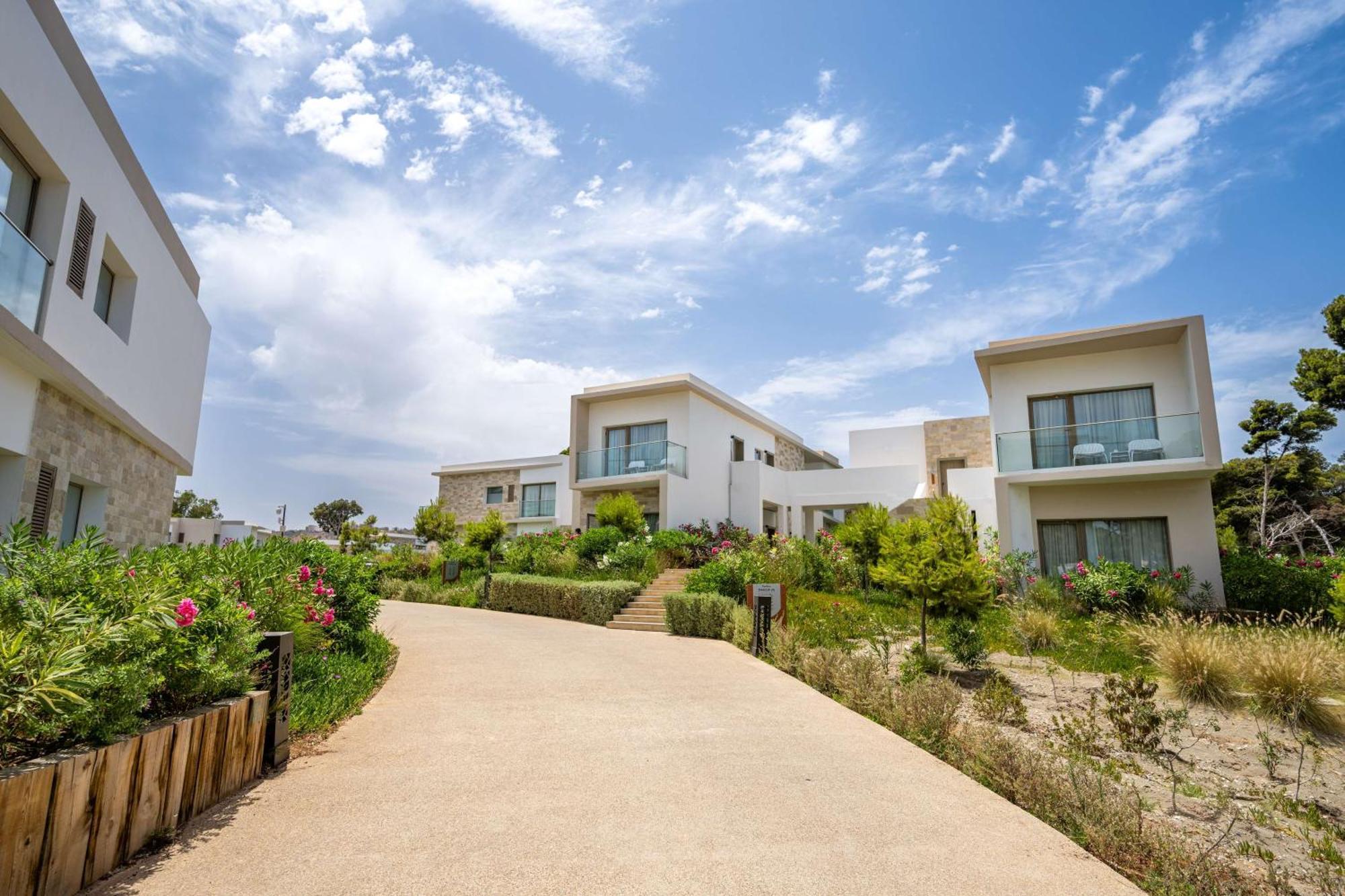 Radisson Blu Resort Эль-Хосейма Экстерьер фото The resort's villas